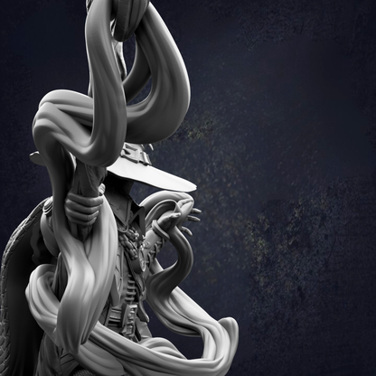 A close-up view of a sculpture depicting a figure with flowing, abstract forms against a dark background.