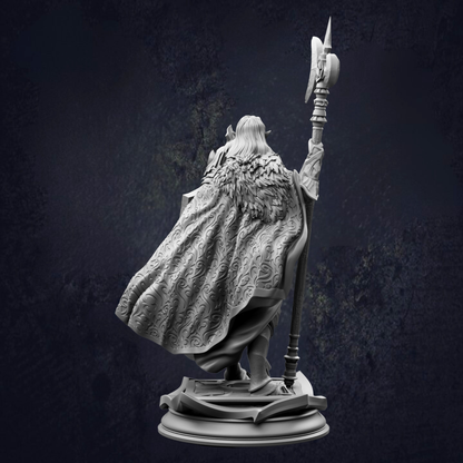 A detailed 3D model of a figure wearing a cape and holding a spear, standing against a dark background.