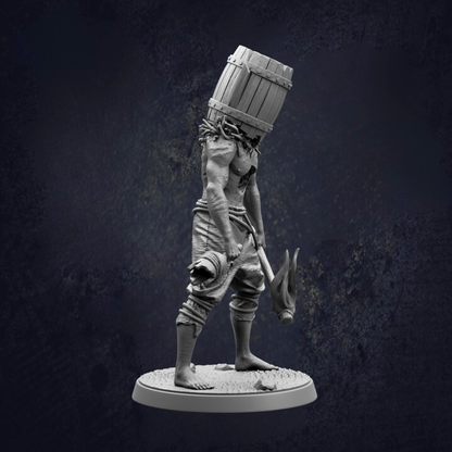 A statue of a person with a barrel on their head, standing on a base.