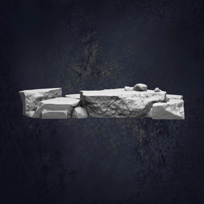 A large, jagged rock formation with a dark, moody background.