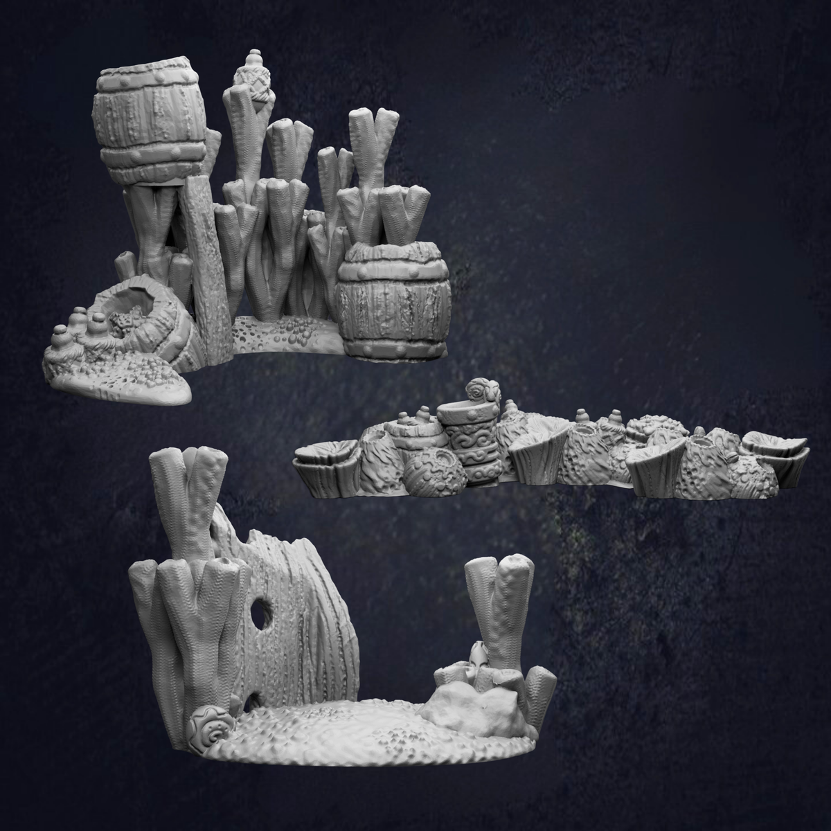 three different sculptures or figurines, each with unique shapes and designs, set against a dark background.