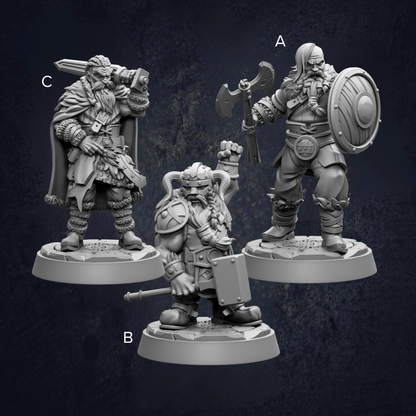 three different figurines of fantasy characters, each with unique poses and weapons, set against a dark background.