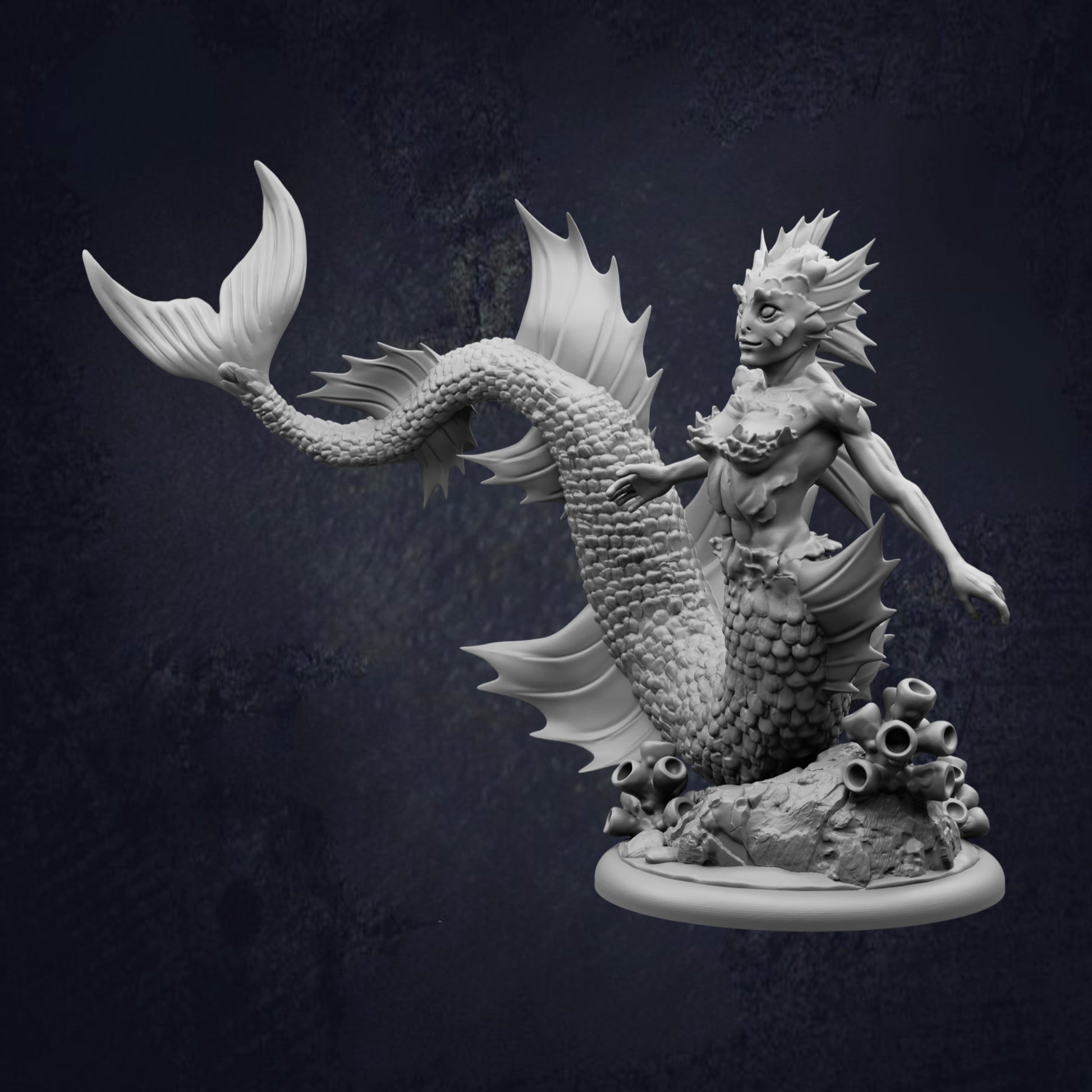 A detailed 3D model of a mermaid-like creature with a tail-like body, fins, and a head with a large, expressive face. The creature appears to be underwater, surrounded by coral or other marine life.