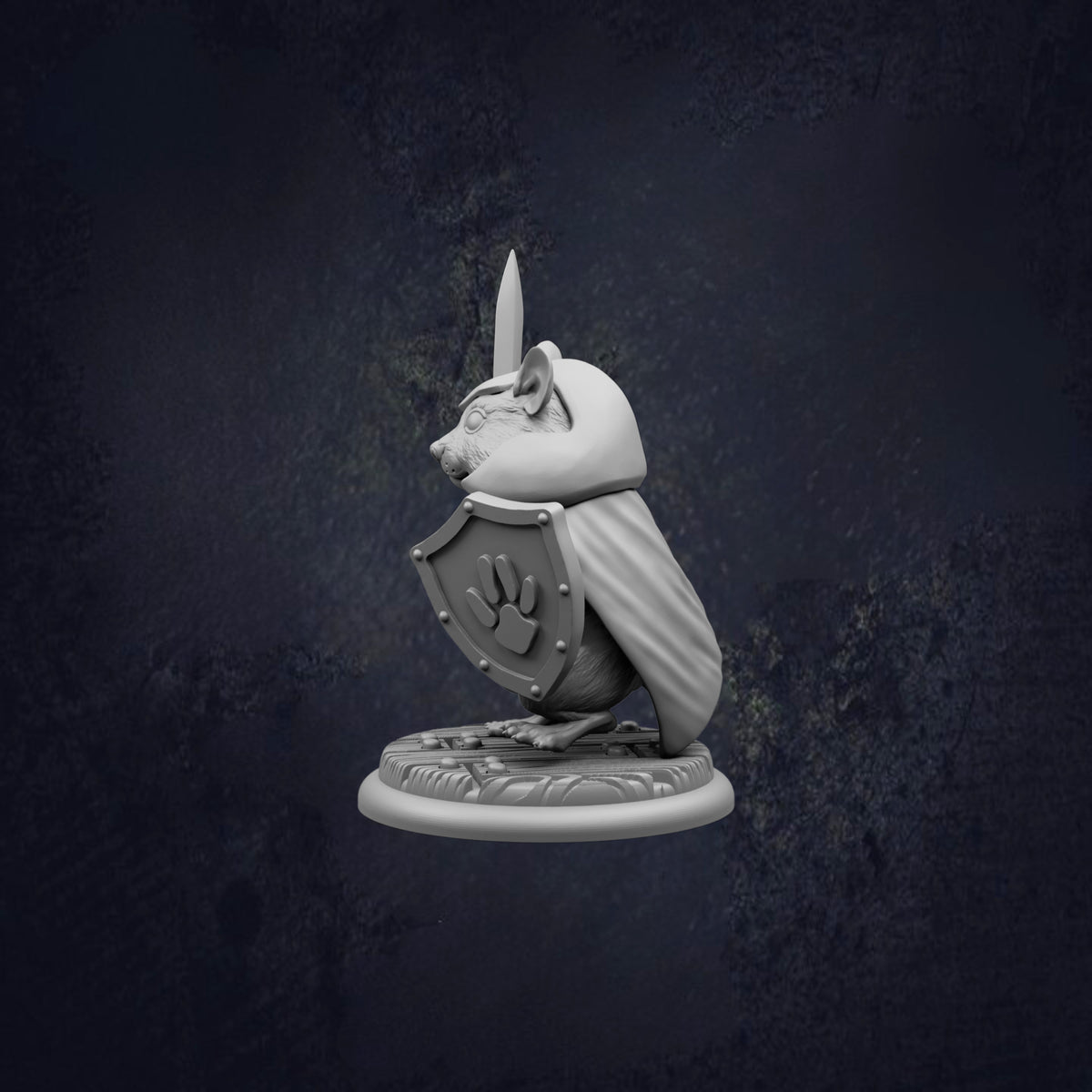 A statue of a mouse wearing a cape and shield, standing on a base.