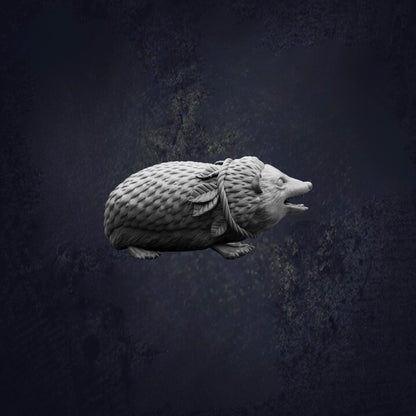 A white sculpture of a hedgehog is shown against a dark background.